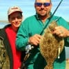 The Luciers of Winnie TX show off this 18 inch flounder Donnie caught on soft plastic
