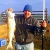 Caught by Dave Rose of Michigan, first time salt water fishing, this 32 inch-14 lb red fish