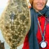 Cynthia Trahan of Ventura CA nabbed this nice flounder while fishing cut mullet