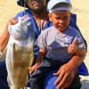Fishin Buds Victor Nelson with Victor JR managed to pull in this nice 28 inch drum they caught on shrimp