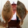 Houston angler Lincoln Philiphuk wade fished Rollover Bay with live finger mullet for these two nice flounder