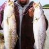 Two trout in two casts- Right is 26 inch-7.5 lbs, Left is 24.5 inches-6 lbs, both caught on soft plastics by Donnie Lucier