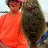 Barbara doing what she does best- catching flounder for supper- ALL R INVITED