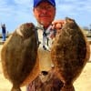Bay wader Ricky Talley of Port Bolivar worked white Gulp shrimp along the bottom to snare these nice flounder