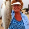 Debbie Ciabattori of Texas City hefts this nice 22inch speck caught on a soft plastic