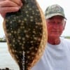 Frank MO Bunyard of Tarkington Prairie TX landed this nice keeper flounder on a finger mullet