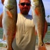 Friendswood TX angler Rick Stanfield nabbed these two nice slot reds while fishing shrimp