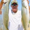 Jackie Bertolino of High Island TX caught these two 26 inch specks- releasing one- on a T-28 MirrOlure