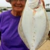 Naome Smith of Gilchrist TX white sided this nice flounder while fishing Berkley Gulp