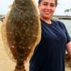 Natalie Walker of Winnie TX nabbed this nice flounder she caught on shrimp