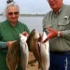 Sam and Rose Walwrath of Goodrich TX night-fished under lights to catch this Rollover Slam of trout, reds, and flounder on speck-rigs