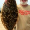 Shelby Camp of Thickett TX waylaid this nce 19inch flounder while fishing a finger mullet