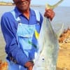 AC Booker of Houston hefts this 12lb Jack Crevalle caught on a finger mullet