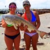 Beauty and the Beast anglerettes Ashton Stanley and Samantha Thomas of Dueyville TX teamed caught and released this HUGE 36inch Bull Red Samantha took on shrimp