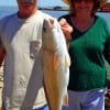 Bill and Raydine Graves took this nice 25inch slot red that Raydine caught on shrimp