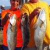 Fishing couple Sharon and Felix Barker of Koontze TX showing off their early morning catch of trout