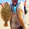 Rick Talley of Galveston waded Rollover bay with a Youzuri soft plastic to catch this nice flounder and red