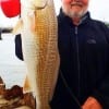 Ron Howard of Katy TX caught this nice 27inch slot red on a finger mullet