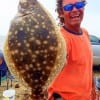 Stuart Yates of Briarcliff TX caught this nice flounder on a finger mullet