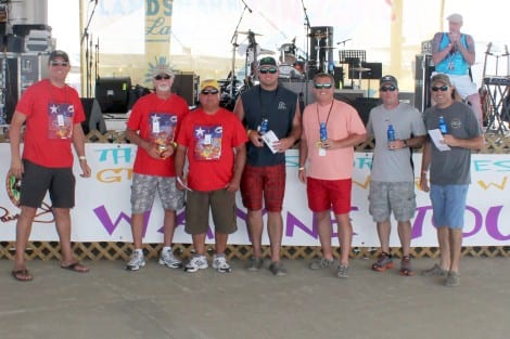 Matthew Osten presenting the winners of the Washers Tournament: 3rd Place-Sandy Boys (Bob Jackson & Donald Mallet), 2nd Place-Team Yolo (Shannon Scott & Taylor Thompson), 1st Place-Thanks For Coming Out (Kevin Choate & Boyd Abshire) 