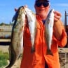 Barry Culbertson of Lufkin TX hefts these nice specks caught on T-28s and soft plastics