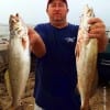 J.R. Garner of Montgomery TX fished THE WALL with T-28s to catch these two nice specks