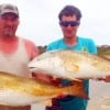 Like father like son- Gary and Patrick Harvey of Ponca City OK took these two 41inch tagger Bull Reds while surf fishing