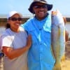 Mr and Mrs Phelps of Pearland TX show off the HUGE sand trout he took on shrimp