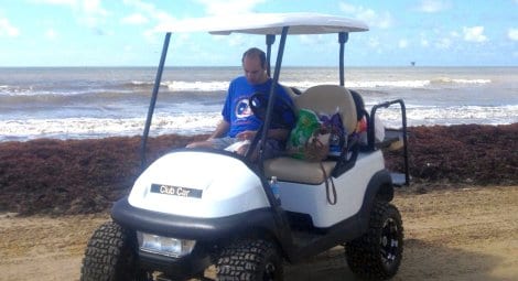 Brenda's son Blake enjoys riding on the beach near their Emerald 2 beach house...in spite of the seaweed!