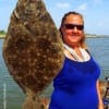 A Flounder Pouder is BORN, with this Berkley Gulp catch by Terrie Riley on landing this 22 inch WHOPPER