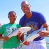 Father and son- Robert and Nicholas Rosario of Cypress TX caught this nice red and mackerel on shrimp