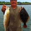 Mr Cardenas of Houston fished finger mullet and gulp to catch this nice red and flounder