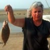 Sandy Sizemore took this nice flatfish while fishing Rollover Pass