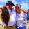 Westwood Fishing Club Prez John Konior with wife Sharon of Trinity TX took this nice flounder on a Berkley Gulp