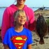 Brother and sister fishing team- Bailey and GW McMaster of Cypress TX took this nice flounder on plastic