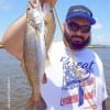Eddie Roman of Houston caught this nice speck and golden croaker on shrimp