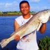 Houston angler Cong Ly caught this HUGE 38 inch Tagger Bull Red on a finger mullet