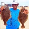 Houston anglerette Shay Williams hefts these two nice flounder caught in the Rollover Bay on Berkley Gulp