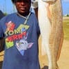 Jonathan King of Houston took this nice 27 inch slot red on live shrimp