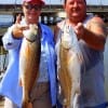Krisina Milburn and Jerry Pucket of Baytown TX took these two nice slot reds on finger mullet