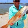 Marine wife Alice Espinoza of Katy caught this nice 26inch slot red while fishing shrimp