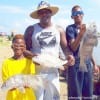 The Lowery family of Pearland TX heft part of their catch of 8 drum- 30 whiting- and one redfish on live shrimp