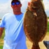 WOW!! A 22 inch flounder took Anahuac angler David Roy's finger mullet- WOW!!