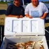 A happy cooler full of golden croaker caught by Sandra Speed and Laura Daniels of Danbury TX