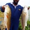 AJ Jeffrey of Spring TX took these 26inch slot reds while fishing finger mullet