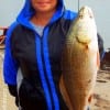 Angela Goodman of Pearland TX took a hook and a 26inch redfish - she removed the hook and kept the red