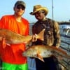 Brandon Johnson and Fishin bud caught these duo reds while fishing live shrimp