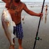 Bruce Wilkinson of Old River TX surfed with cut croaker to nab this 40plus inch tagger bull red
