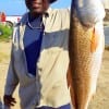 Claude Thomas of Houston took this nice 27inch slot red on live shrimp