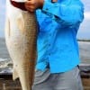 Eric Larousse of Beaumont tackled this 38inch tagger bull red fishing cut croaker in the surf